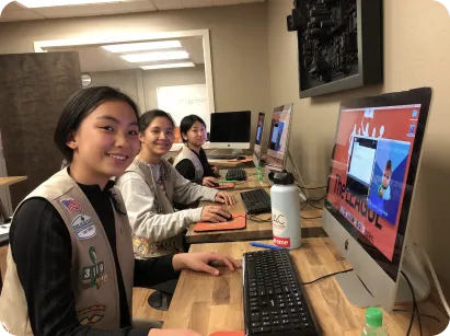 Girl Scouts learning robotics at The LEAGUE